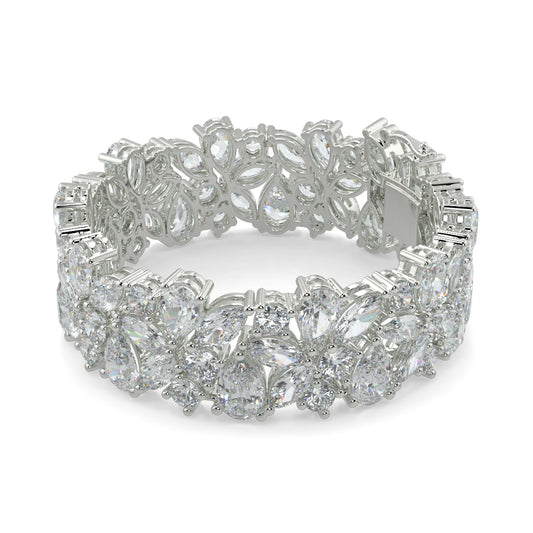 Silver bracelet with floral design on a white background yb jewellers designer bracelet with fancy diamonds and set in platinum 18k white gold