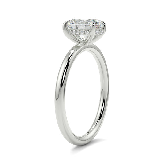 Diamond ring on a white background yb_jewellers_solitaire_engagement_ring_best_selling_design_cushion_shape_diamond_4_claw_with_a_slim_band