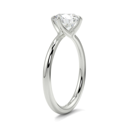 Silver ring with a clear gemstone on a white background yb jewellers twist band engagement ring best selling design round diamond trending rings