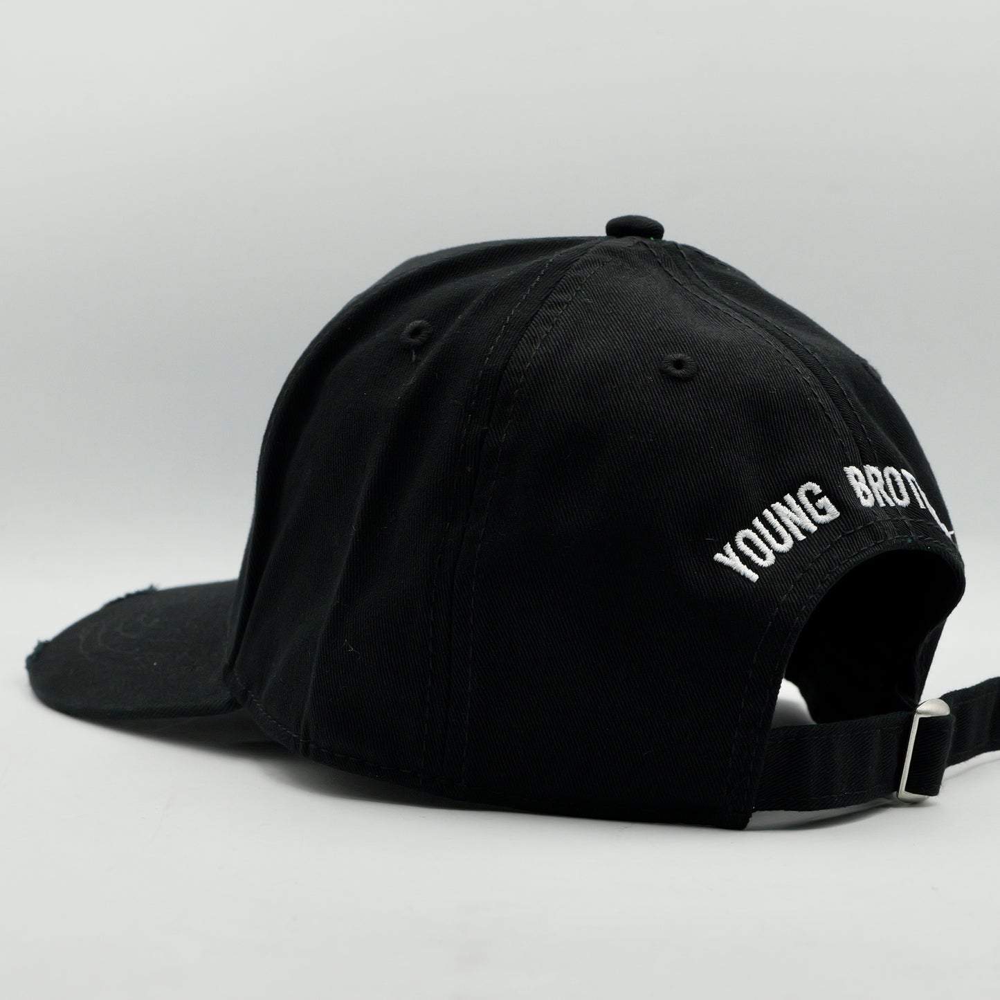 Black cap with 'YOUNG BRothers text on a white background