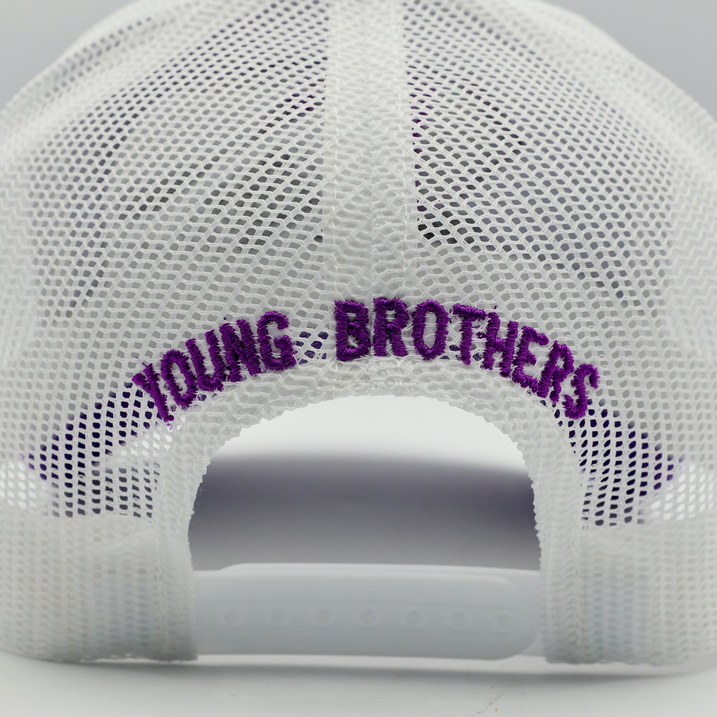 White mesh cap with 'YOUNG BROTHERS' text in purple on a white background