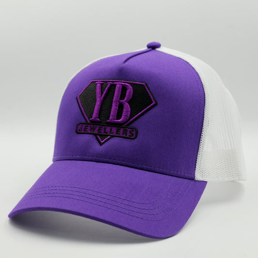 Purple and white cap with 'YB' logo on a gray background