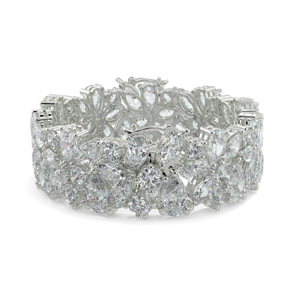 Silver bracelet with clear gemstones on a white background yb jewellers designer bracelet with fancy diamonds and set in platinum 18k white gold 