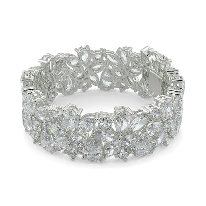 Silver bracelet with floral design on a white background  yb jewellers designer bracelet with fancy diamonds and set in platinum 18k white gold 