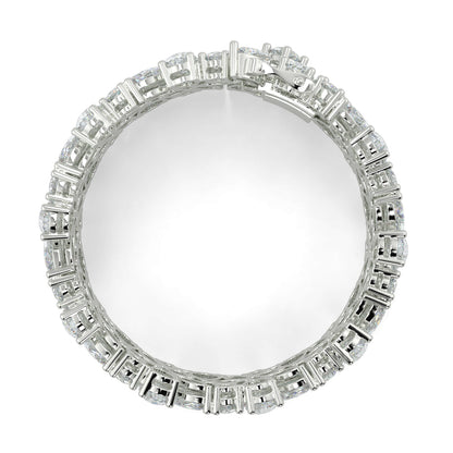 Diamond ring with a round center and rectangular baguette diamonds on a white background yb jewellers designer bracelet with fancy diamonds and set in platinum 18k white gold 