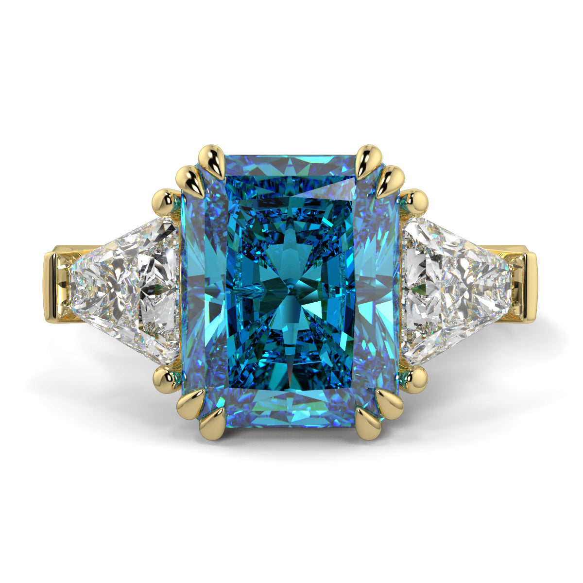 Ring with a blue gemstone and gold accents on a white background Introducing daisy radient square blue lab grown diamond engagement ring set in yellow gold with lab grown side diamonds 18k yellow gold coloured diamond ring 