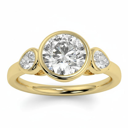 Gold ring with three diamonds on a white background yb jewellers vintage athena ring design with 3 round diamonds best selling design and trending engagement ring 
