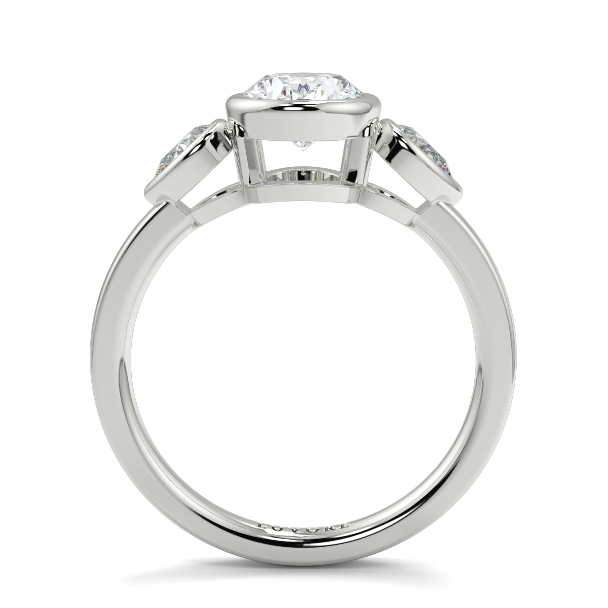 Diamond ring with a white gold band on a white background oval and pear diamond trilogy ring yb jewellers best selling design and engagement rings 