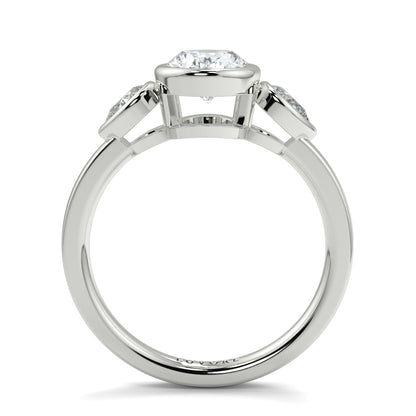 Diamond ring with a white gold band on a white background oval and pear diamond trilogy ring yb jewellers best selling design and engagement rings 