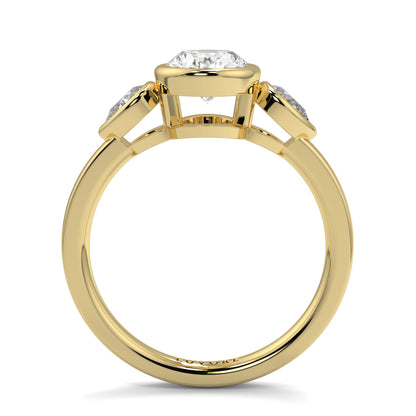 Gold ring with a diamond on a white background oval and pear diamond trilogy ring yb jewellers best selling design and engagement rings 