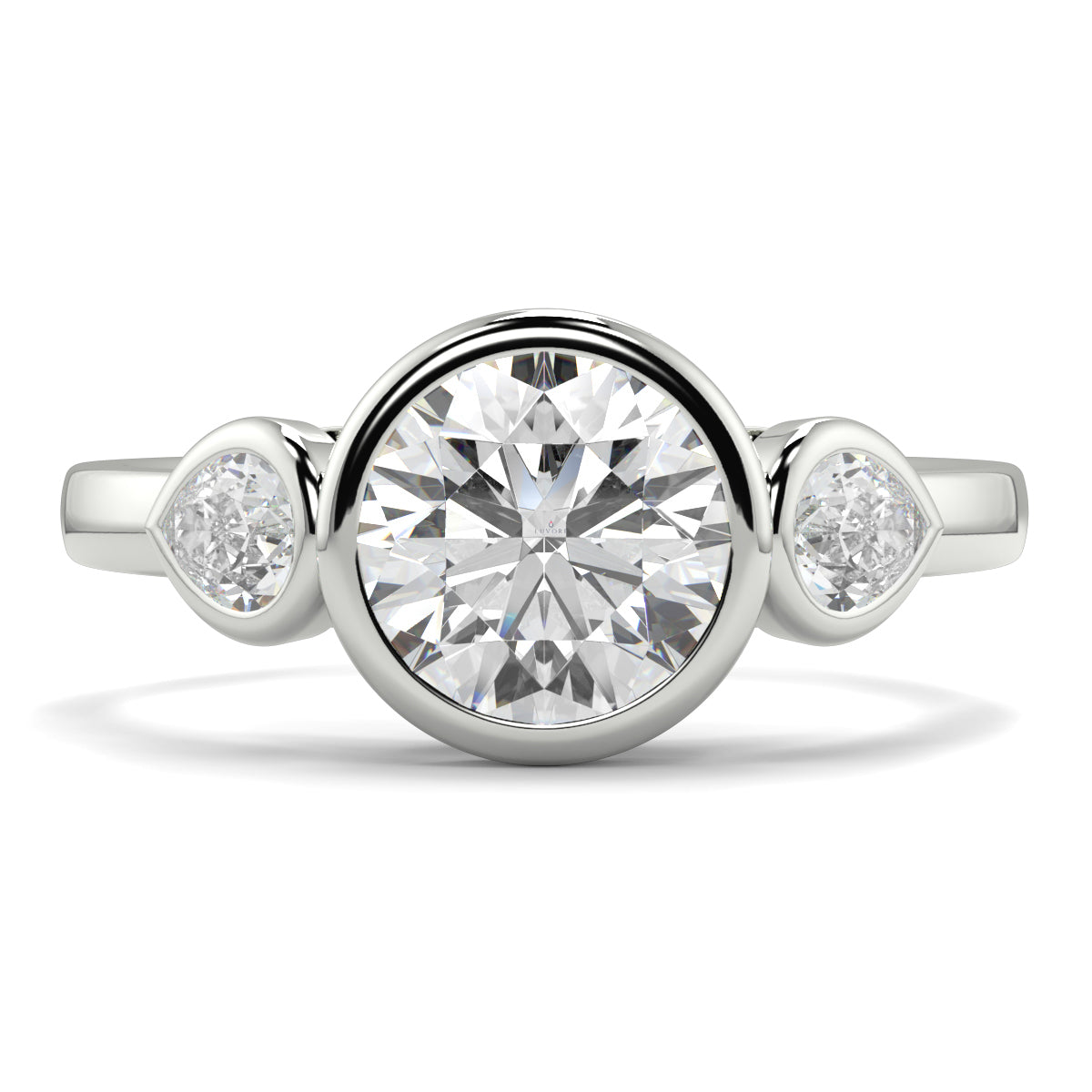 Silver ring with a large central diamond and two smaller diamonds on the sides against a white background yb jewellers vintage athena ring design with 3 round diamonds best selling design and trending engagement ring 