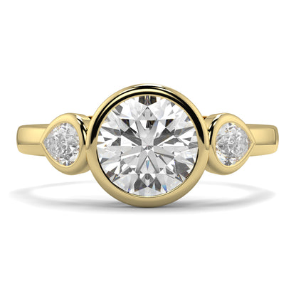 Gold ring with a central diamond and two smaller diamonds on a white background yb jewellers vintage athena ring design with 3 round diamonds best selling design and trending engagement ring 