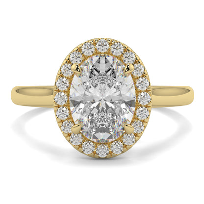 Gold ring with a large central diamond and smaller diamonds around on a white background yb jewellers iamond halo with plain shoulder oval shape 