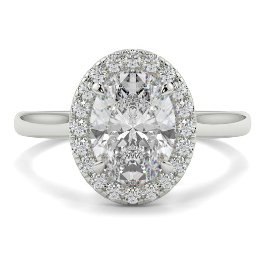 Diamond ring with a halo on a white background yb jewellers iamond halo with plain shoulder oval shape 