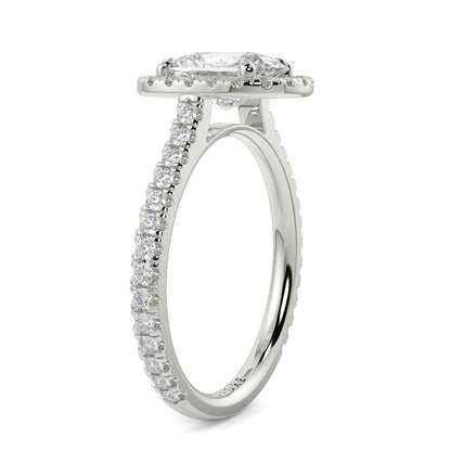 Diamond ring with a central gemstone and smaller diamonds on a white  YB Jewellers engagement ring best value background