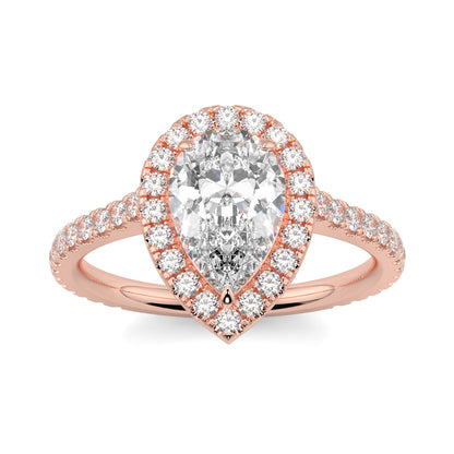 Rose gold ring with a pear-shaped diamond and smaller diamonds on a white background yb jewellers Pear engagement ring 