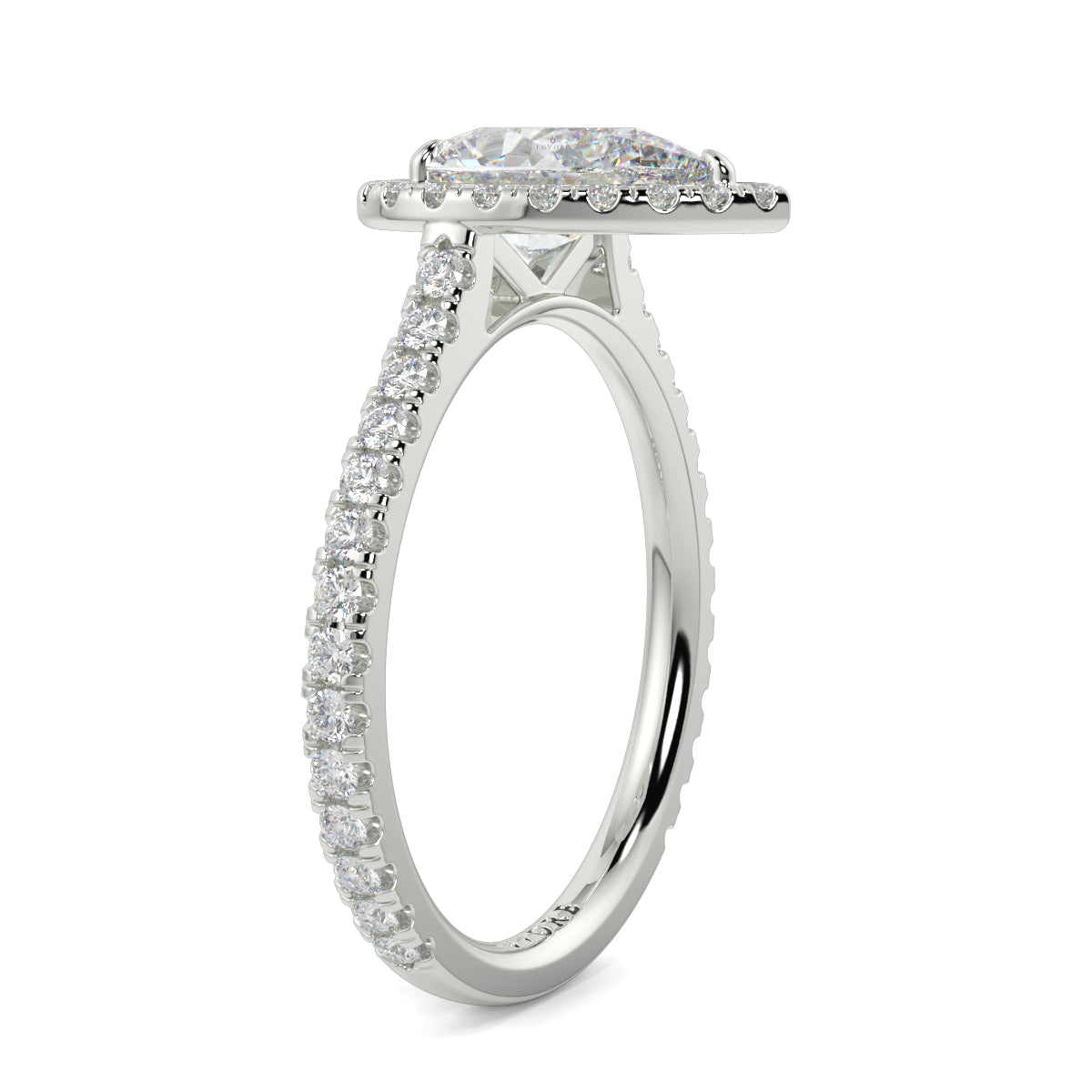 Diamond ring with a halo and smaller diamonds on a white background yb jewellers Pear engagement ring 