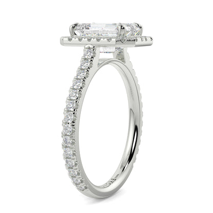 Diamond ring with a rectangular center stone on a white background YB_Jewellers_Engagement_Ring