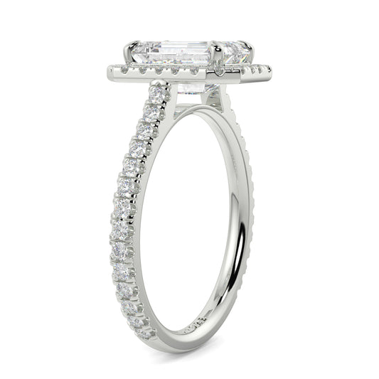 Diamond ring with a rectangular center stone on a white background YB_Jewellers_Engagement_Ring