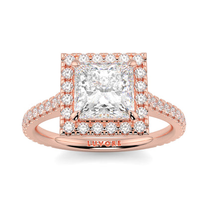 Rose gold ring with a large diamond and smaller diamonds on a white  yb jewellers engagement ring princess cut diamond ring tiger claws background