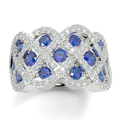 Silver ring with blue gemstones on a white background yb jewellers best selling eternity rin design in diamonds and sapphires micro setting diamond band 