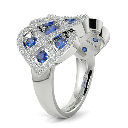 Silver ring with blue gemstones on a white background yb jewellers best selling eternity rin design in diamonds and sapphires micro setting diamond band 