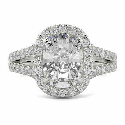 Diamond ring with a central oval-cut diamond and smaller diamonds on a white backgroundyb jewellers split halo diamond engagement ring best selling design trending cushion cut diamond 