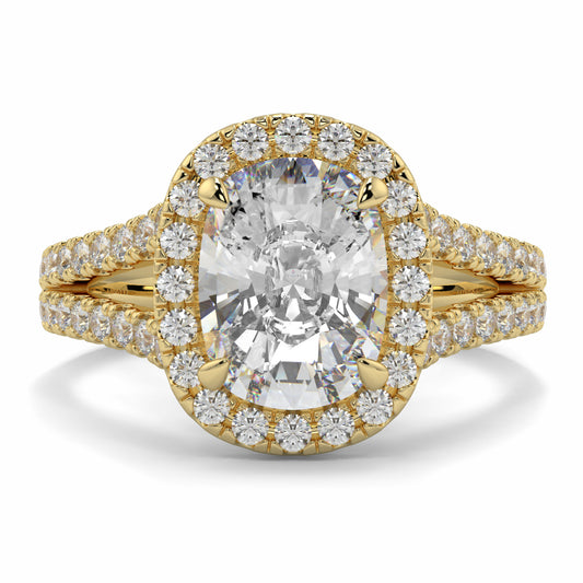 Gold ring with a large central diamond and smaller diamonds around on a white background yb jewellers split halo diamond engagement ring best selling design trending cushion cut diamond