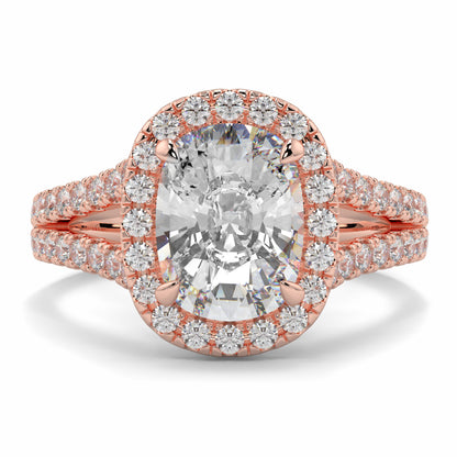 Rose gold ring with a large diamond and smaller diamonds on a white background yb jewellers split halo diamond engagement ring best selling design trending cushion cut diamond