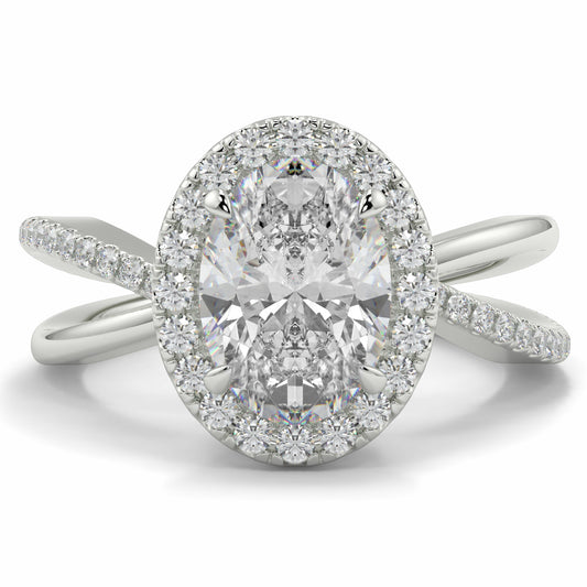 Diamond ring with a halo of smaller diamonds on a white background Yb jewellers oval diamond halo platinum diamond engagement ring bestseller trending design 