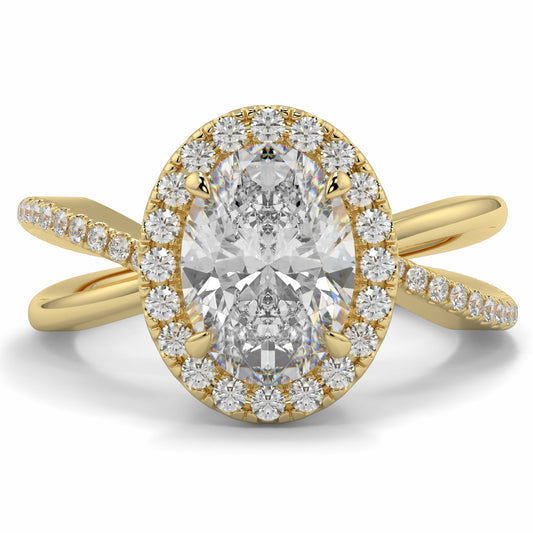 Gold ring with a large diamond and smaller diamonds around on a white background Yb jewellers oval diamond halo platinum diamond engagement ring bestseller trending design 
