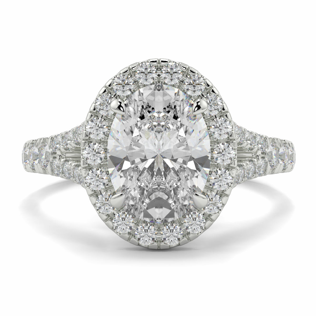 Diamond ring with a white background Yb jewellers oval diamond halo platinum diamond engagement ring bestseller trending design 