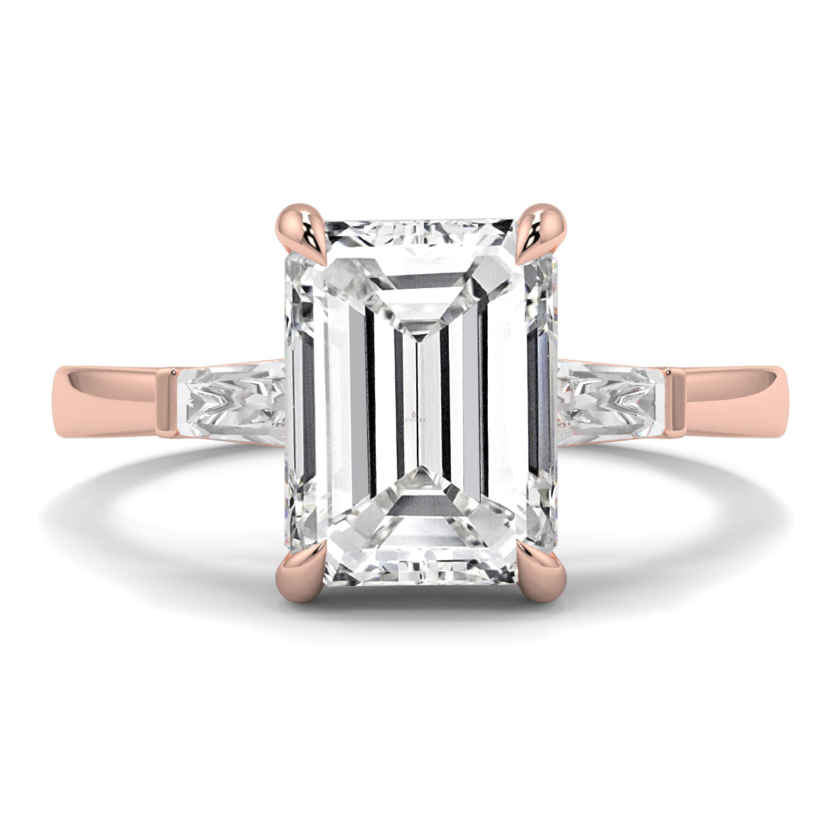 Rose gold ring with a large emerald-cut diamond on a white background yb_jewellers_3_stone_trilogy_engagement_ring_round_and_pear_shape_best_selling_design_trending_diamond_ring