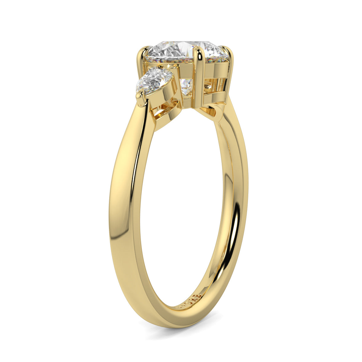 Gold ring with a diamond on a white background yb jewellers 3 stone trilogy engagement ring round and pear shape best selling design trending diamond ring