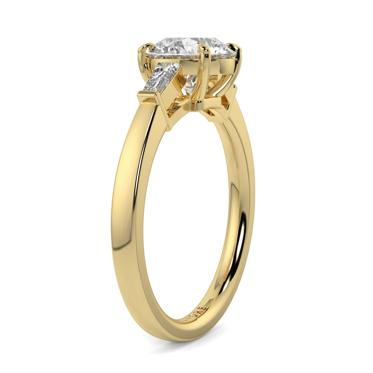 Gold ring with a diamond on a white background yb_jewellers_3_stone_trilogy_engagement_ring_round_and_pear_shape_best_selling_design_trending_diamond_ring