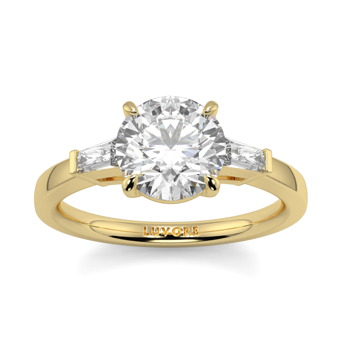 Gold ring with a large diamond and smaller diamonds on the shoulders, on a white background. yb_jewellers_3_stone_trilogy_engagement_ring_round_and_pear_shape_best_selling_design_trending_diamond_ring