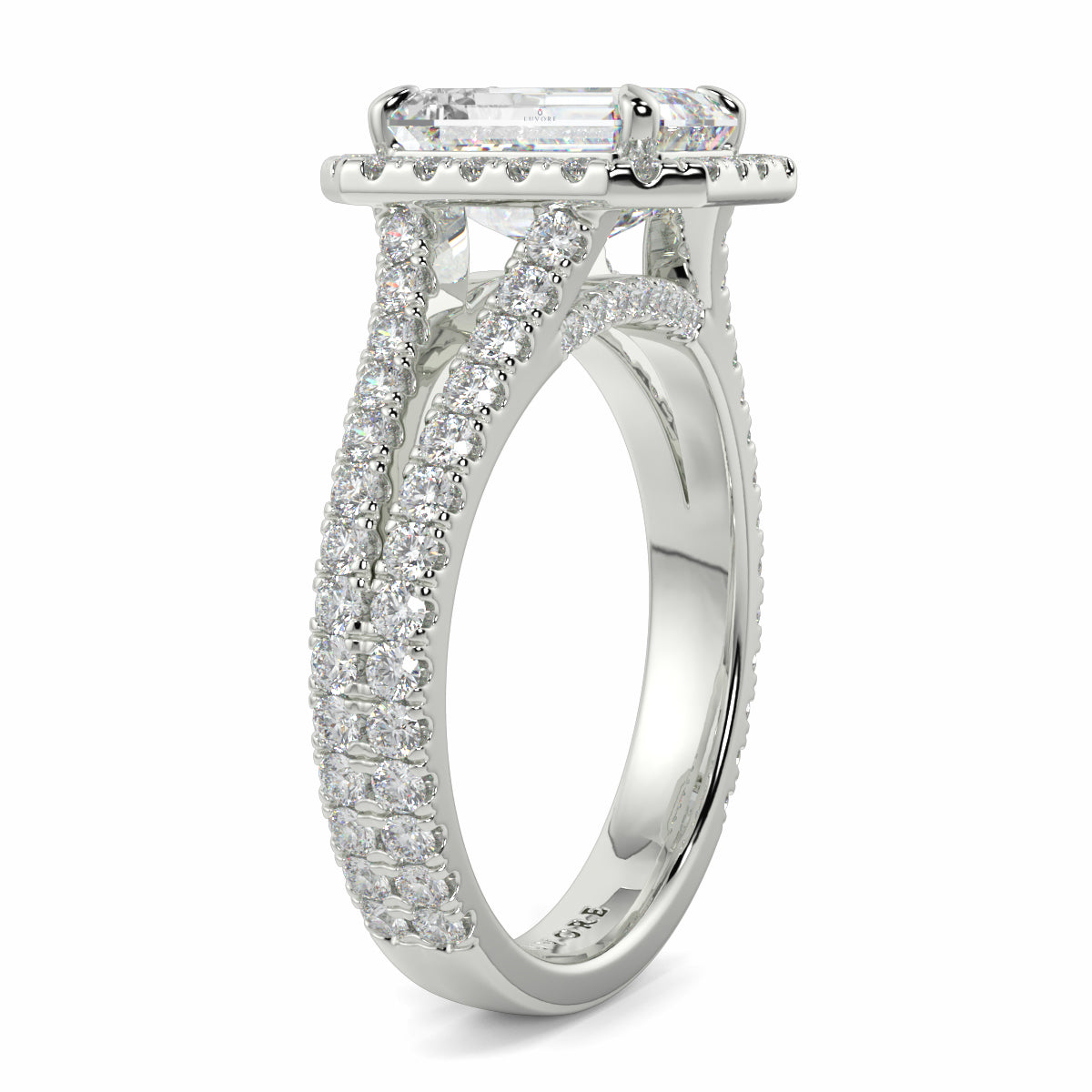 Silver ring with diamond accents on a white background Yb jewellers emerald split halo diamond engagement ring 