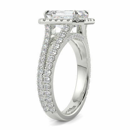 Silver ring with diamond accents on a white background Yb jewellers emerald split halo diamond engagement ring 