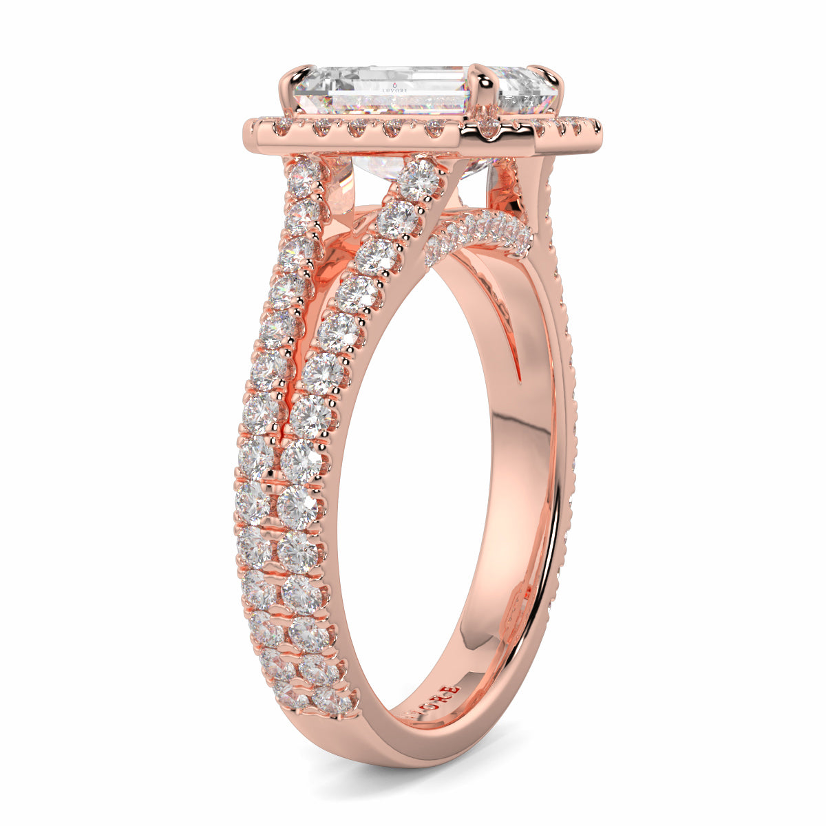 Rose gold ring with diamond accents on a white background Yb jewellers emerald split halo diamond engagement ring 