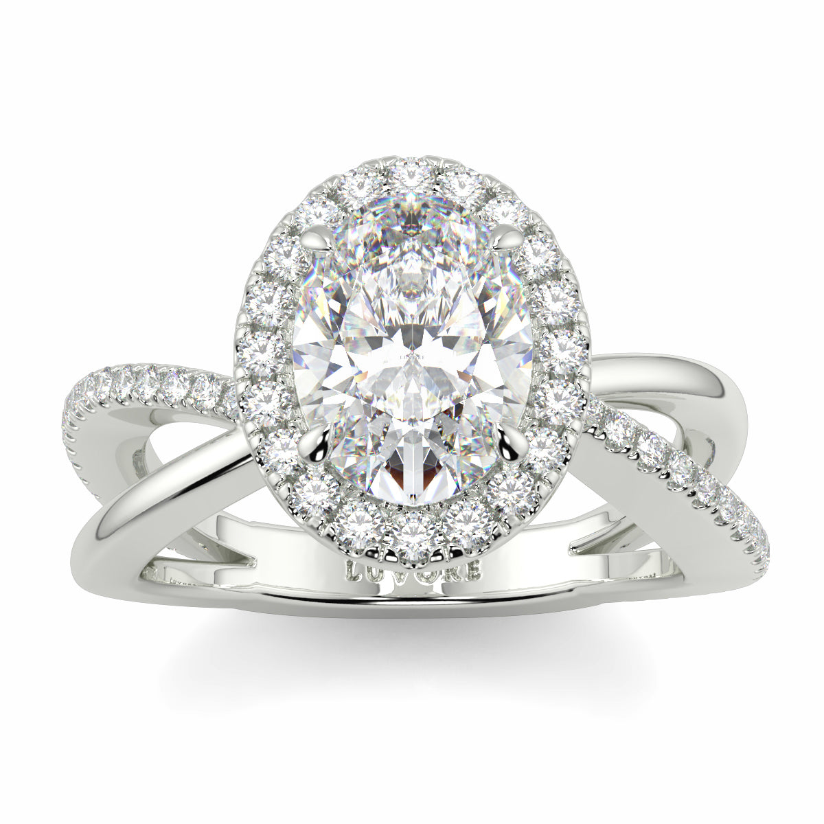 Diamond ring with a halo and intricate design on a white background Yb jewellers oval diamond halo platinum diamond engagement ring bestseller trending design 