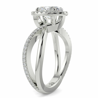 Silver ring with diamond accents on a white background Yb jewellers oval diamond halo platinum diamond engagement ring bestseller trending design 