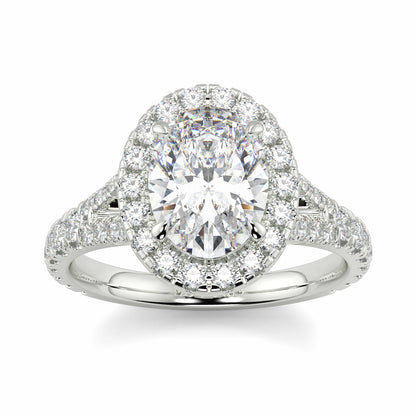 Diamond ring with a halo and intricate design on a white background Yb jewellers oval diamond halo platinum diamond engagement ring bestseller trending design 