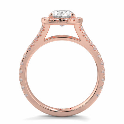Rose gold ring with a diamond on a white background Yb jewellers oval diamond halo platinum diamond engagement ring bestseller trending design 