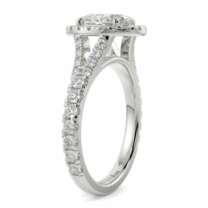 Silver ring with diamond accents on a white background Yb jewellers oval diamond halo platinum diamond engagement ring bestseller trending design 