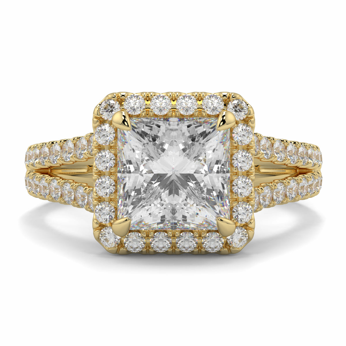 Gold ring with a large central diamond and smaller diamonds around on a white background yb jewellers twist halo princess shape engagement diamond ring best selling design ring and trending design 2026