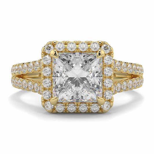 Gold ring with a large central diamond and smaller diamonds around on a white background yb jewellers twist halo princess shape engagement diamond ring best selling design ring and trending design 2026