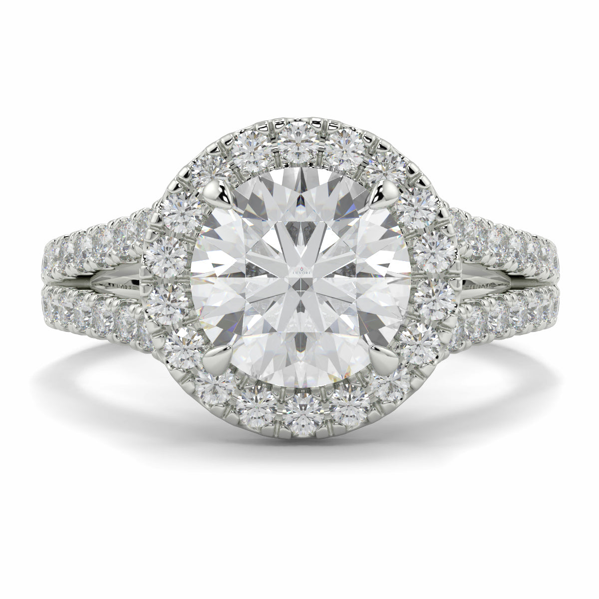 Diamond ring with a halo and smaller diamonds on a white background yb jewellers twist halo round shape engagement diamond ring best selling design ring and trending design 2026