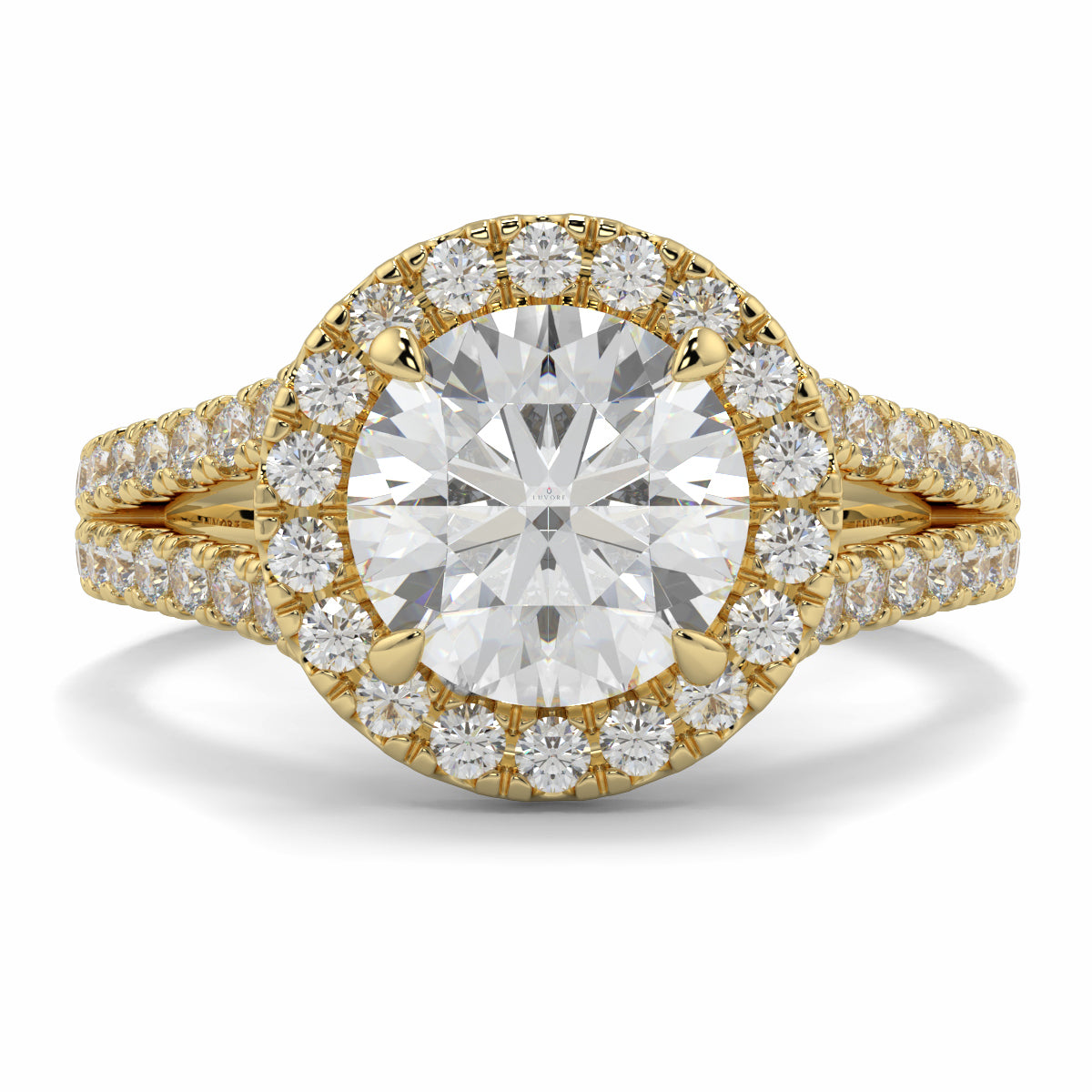 Gold ring with a large diamond and smaller diamonds around on a white background yb jewellers twist halo round shape engagement diamond ring best selling design ring and trending design 2026