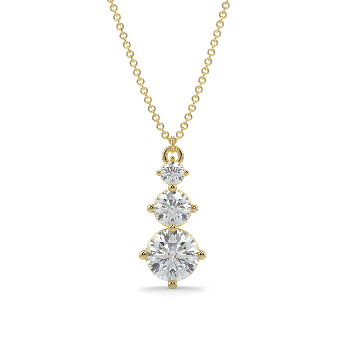 Gold necklace with three diamond pendants on a white background
