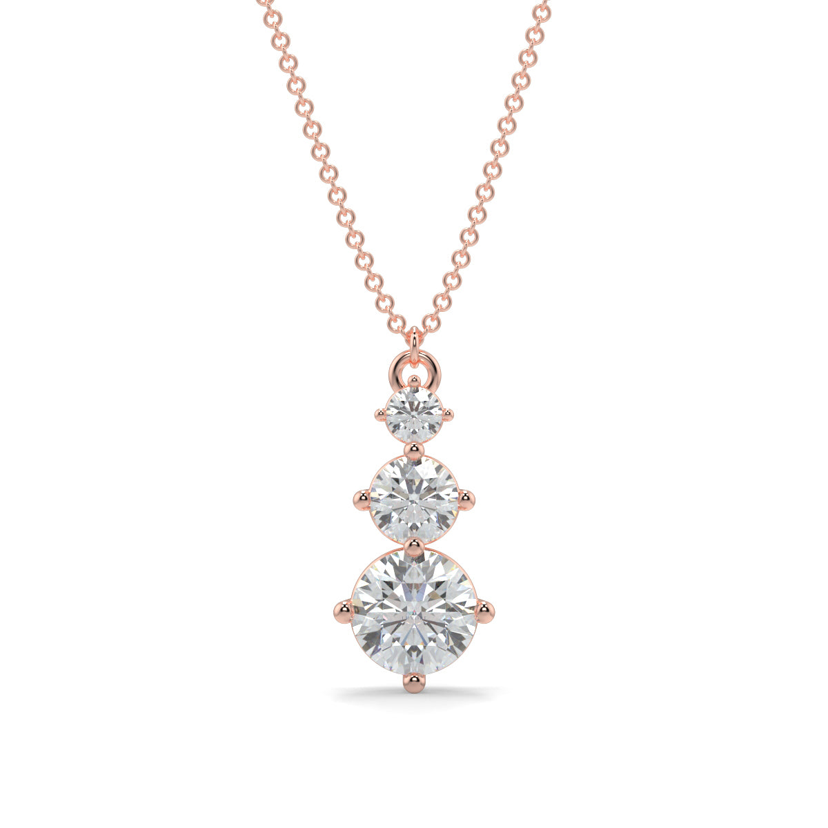 Rose gold necklace with three diamond pendants on a white background